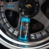 Butelka SAPPHIRE Ceramic Spray Coat oparta o felgę sportowego koła